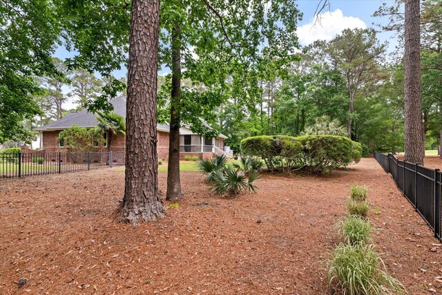 view of yard featuring fence