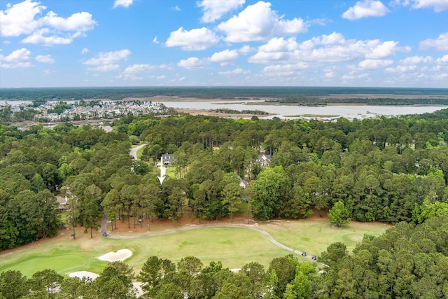 aerial overview of property's location featuring a golf club and a large body of water