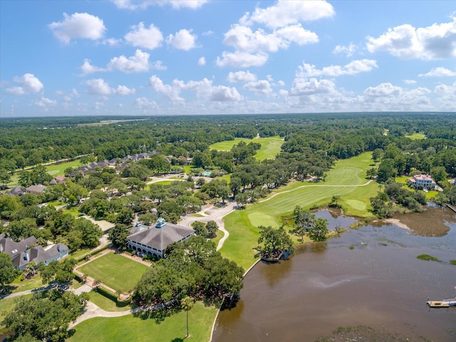 bird's eye view of a large body of water, a local golf course, and a heavily wooded area