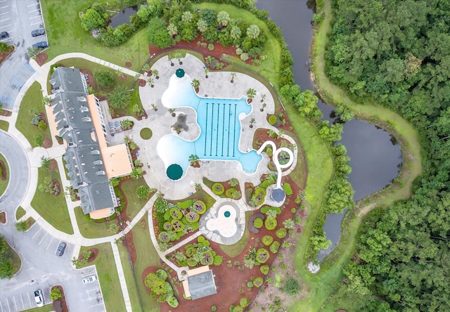 drone / aerial view of a pool