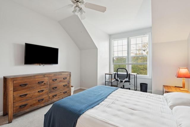 bedroom featuring light colored carpet, ceiling fan, and lofted ceiling