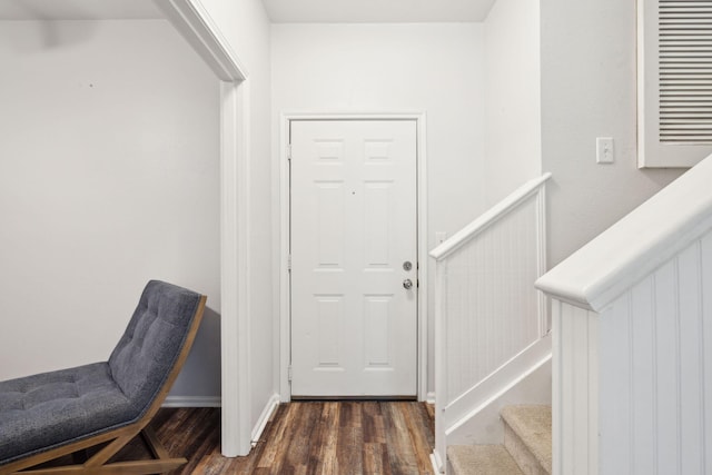 foyer entrance featuring dark hardwood / wood-style flooring