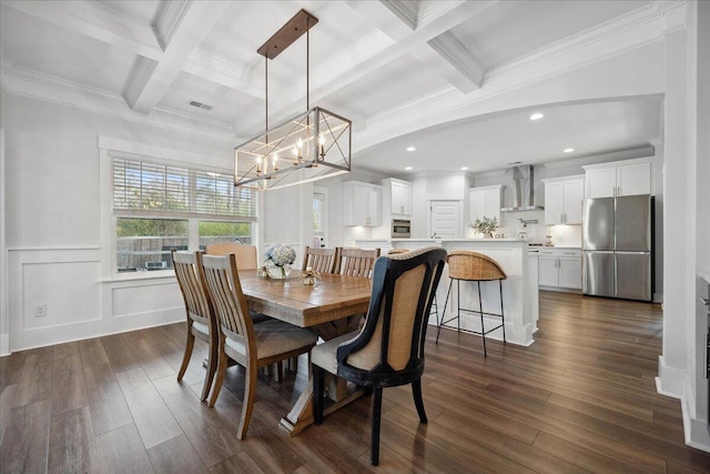 dining room featuring a healthy amount of sunlight, dark wood-style floors, and a chandelier