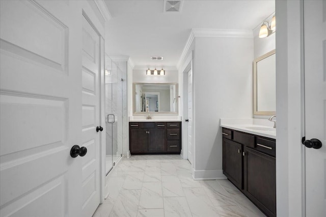 full bathroom featuring visible vents, marble finish floor, crown molding, and a sink