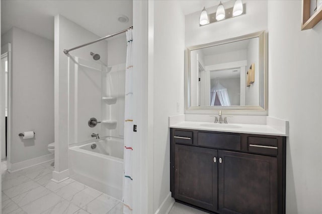 full bathroom featuring vanity, baseboards, shower / washtub combination, toilet, and marble finish floor