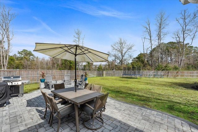 view of patio / terrace featuring outdoor dining space and a fenced backyard