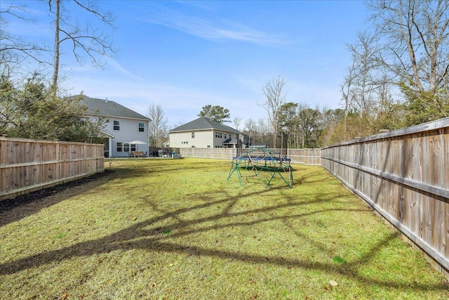 view of yard featuring a fenced backyard