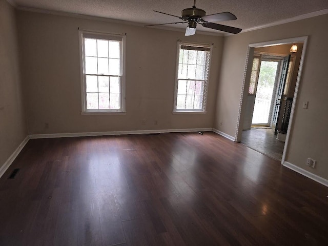 2858 Riley St, Orangeburg, SC 29118 - unfurnished room with dark wood finished floors, a textured ceiling, ceiling fan, and visible vents