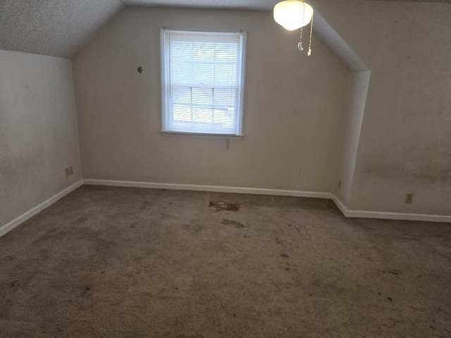 2858 Riley St, Orangeburg, SC 29118 - bonus room with baseboards, vaulted ceiling, and carpet