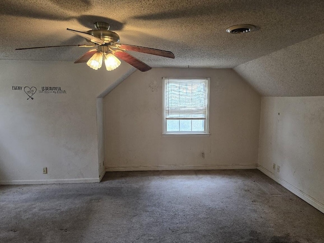 2858 Riley St, Orangeburg, SC 29118 - additional living space featuring vaulted ceiling, carpet flooring, and a textured ceiling