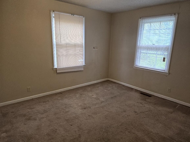 2858 Riley St, Orangeburg, SC 29118 - empty room with baseboards, visible vents, and carpet