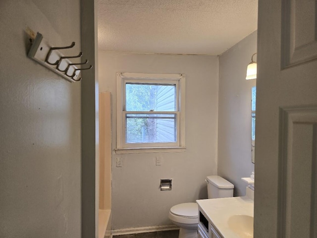 2858 Riley St, Orangeburg, SC 29118 - full bathroom with toilet, a shower, vanity, and a textured ceiling