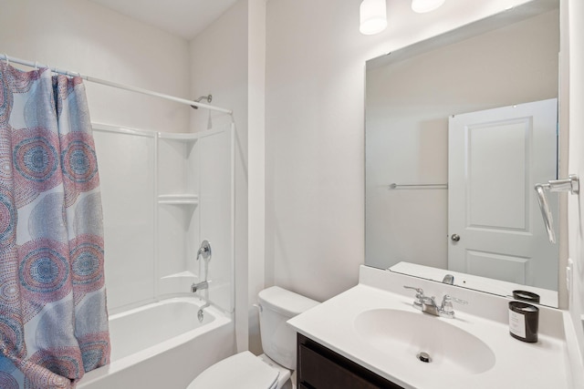 full bathroom featuring shower / tub combo with curtain, vanity, and toilet