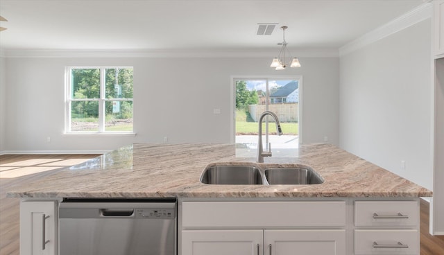 kitchen with stainless steel dishwasher, a sink, visible vents, and a healthy amount of sunlight