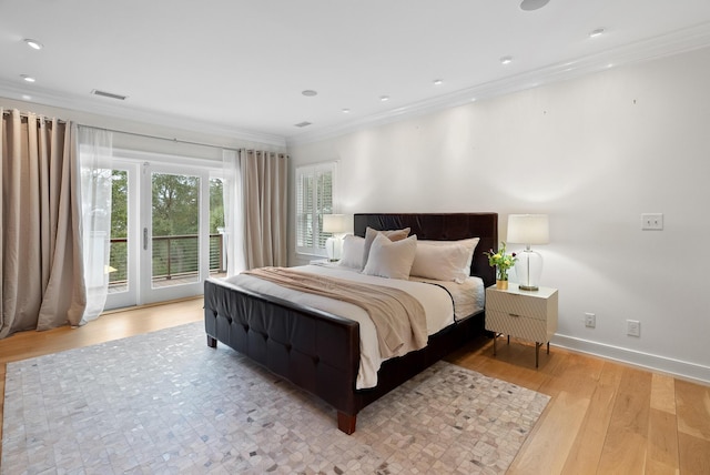 bedroom with visible vents, baseboards, light wood-style flooring, ornamental molding, and access to outside