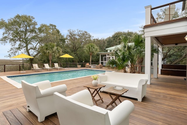 view of pool featuring an outdoor hangout area and a fenced in pool