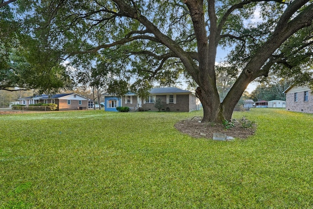 exterior space featuring a front lawn