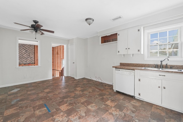 kitchen with white dishwasher, ceiling fan, white cabinetry, and sink