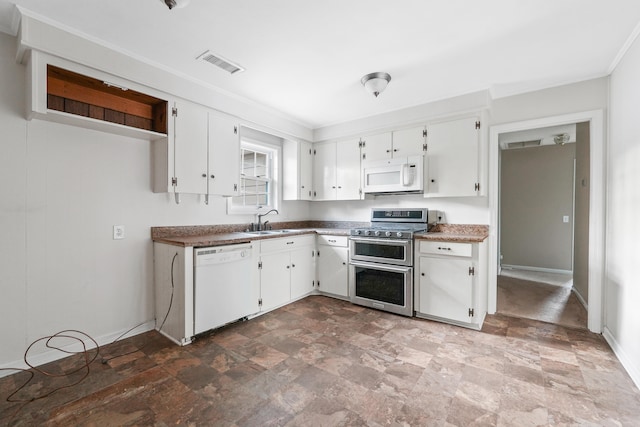 kitchen featuring white cabinetry, sink, white appliances, and ornamental molding