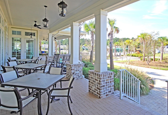 view of patio / terrace with french doors and ceiling fan