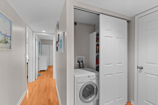 1627 Live Oak Park, Seabrook Island, SC 29455 - laundry area with washer / dryer, light wood-type flooring, recessed lighting, and baseboards