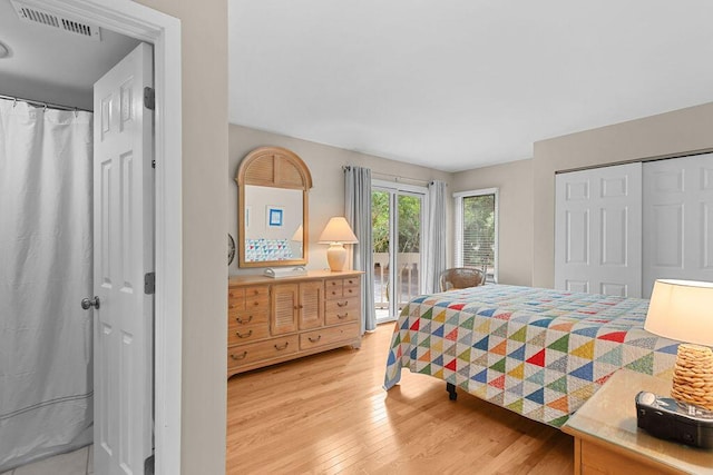 1627 Live Oak Park, Seabrook Island, SC 29455 - bedroom featuring access to exterior, wood finished floors, and a closet