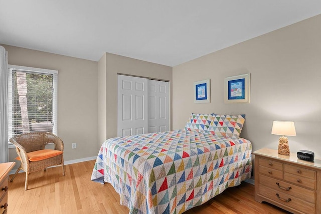 1627 Live Oak Park, Seabrook Island, SC 29455 - bedroom featuring light wood finished floors, baseboards, and a closet