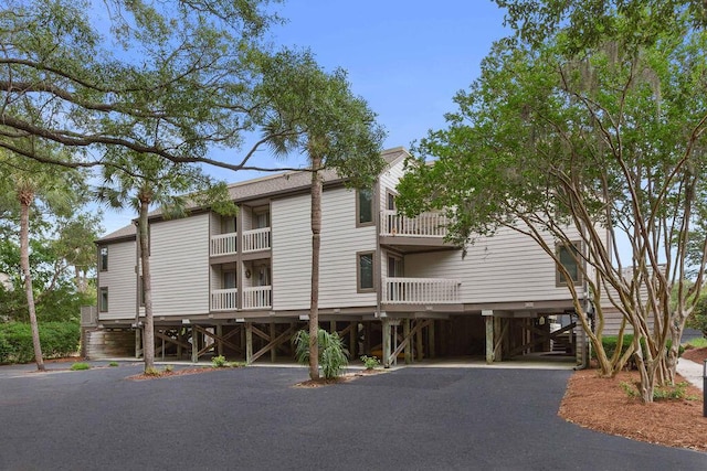 1627 Live Oak Park, Seabrook Island, SC 29455 - view of building exterior featuring a carport