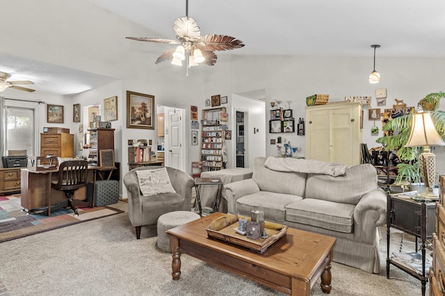 living room featuring high vaulted ceiling, light colored carpet, and a ceiling fan