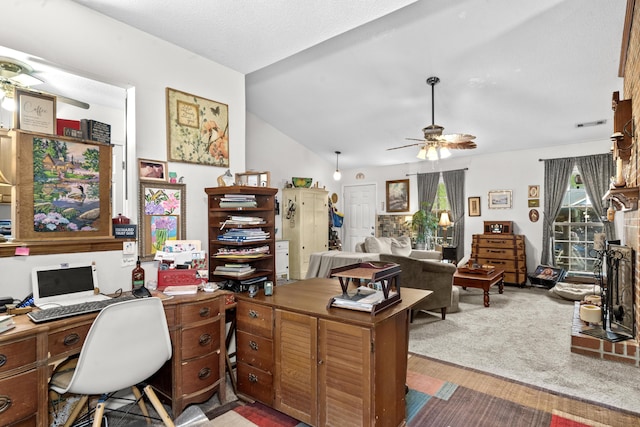 office featuring carpet flooring, lofted ceiling, and ceiling fan