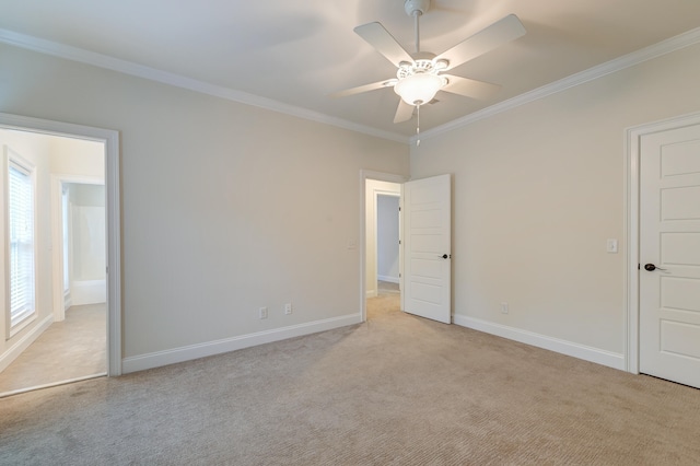 unfurnished bedroom with light carpet, ceiling fan, and crown molding