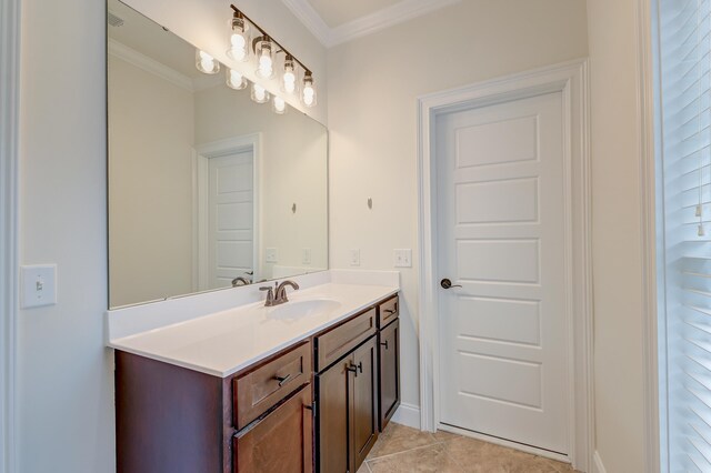 bathroom with vanity, tile patterned floors, and ornamental molding