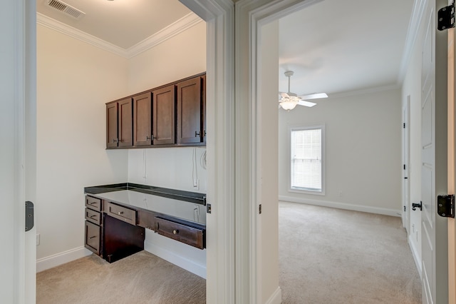 bathroom featuring ornamental molding and ceiling fan