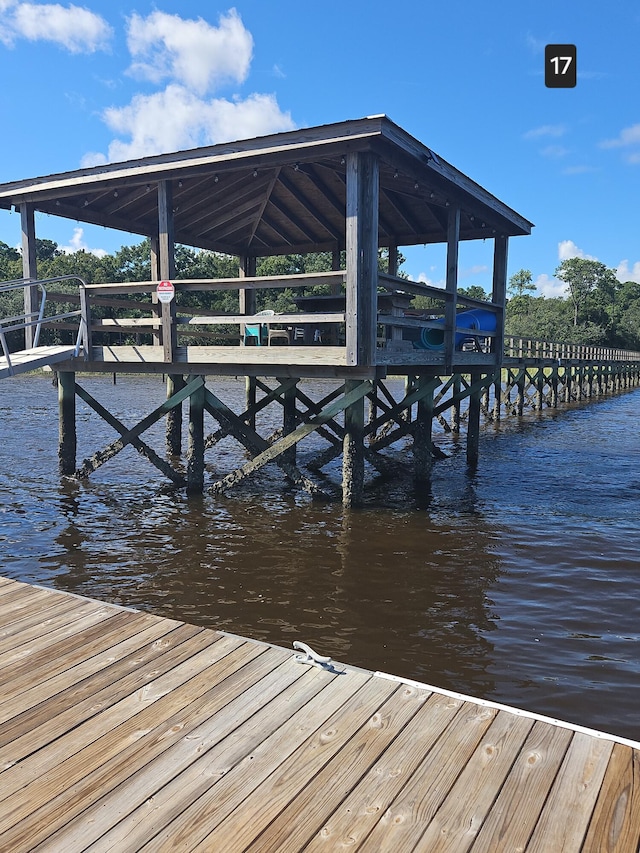 dock area featuring a water view