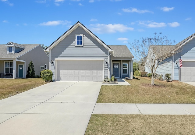 view of front of property with a front yard and concrete driveway
