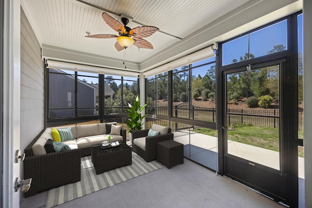 sunroom / solarium with an outdoor hangout area, ceiling fan, and plenty of natural light
