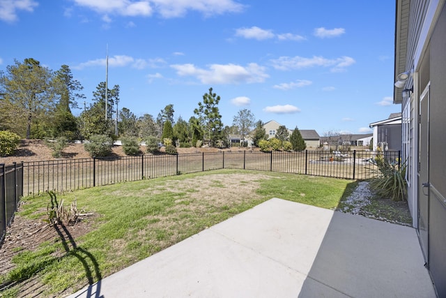 view of yard with a fenced backyard and a patio area