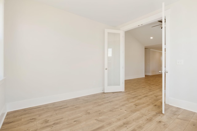 unfurnished room with light wood-type flooring