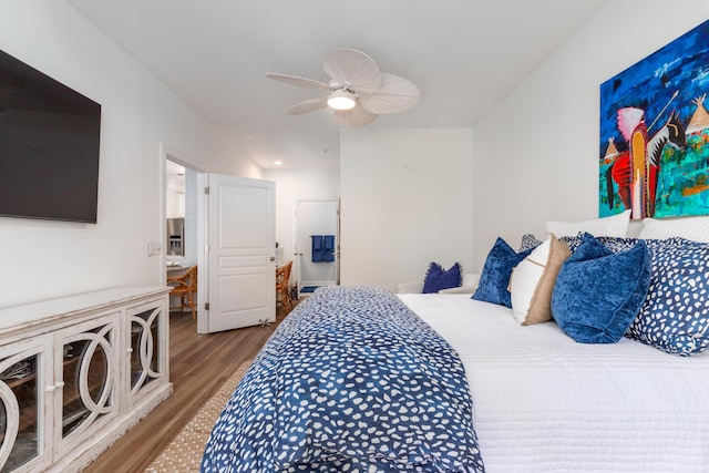 bedroom featuring wood-type flooring and ceiling fan