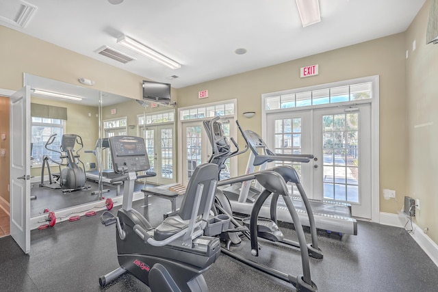 workout area with french doors, healthy amount of natural light, and baseboards