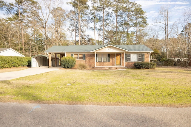 ranch-style house with a carport, concrete driveway, brick siding, and a front lawn