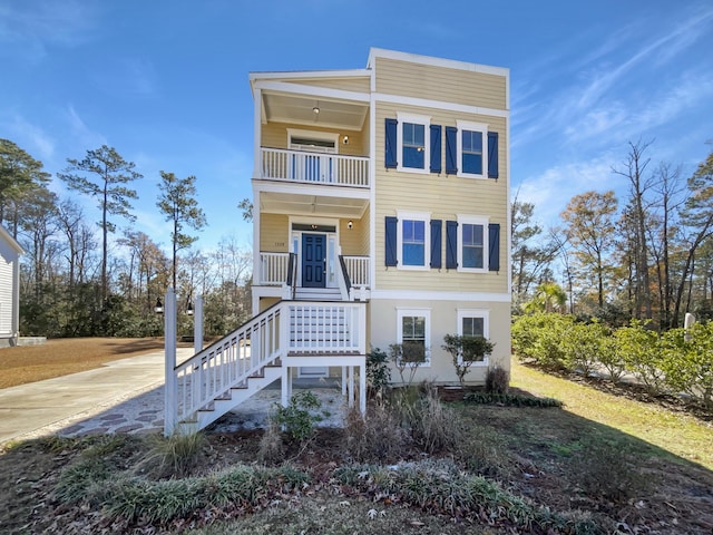 view of front of house with a balcony and a porch