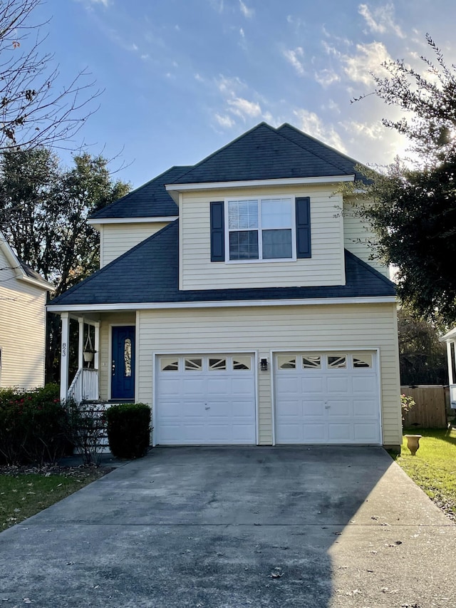 front facade with a garage