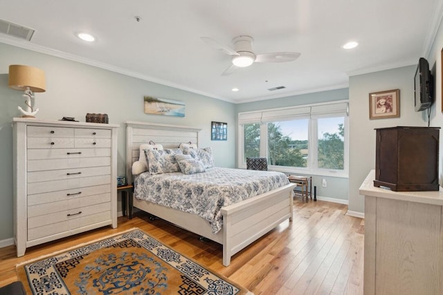 bedroom with wood-type flooring, ceiling fan, and crown molding