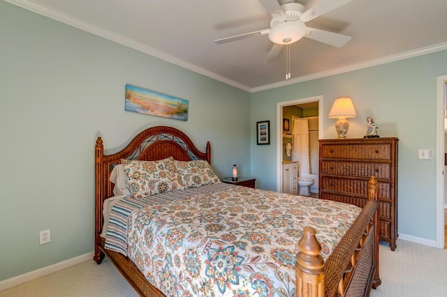 bedroom featuring ceiling fan, crown molding, light carpet, and connected bathroom