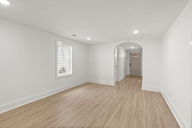 unfurnished room featuring light hardwood / wood-style flooring