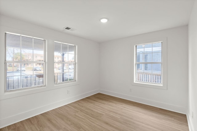 empty room with light wood-type flooring