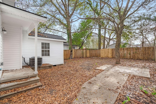 view of yard featuring central AC unit