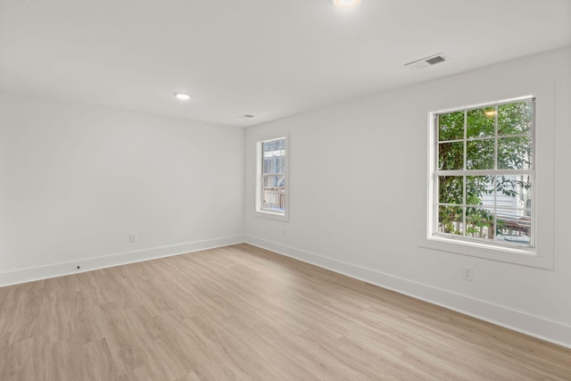 empty room with light wood-type flooring