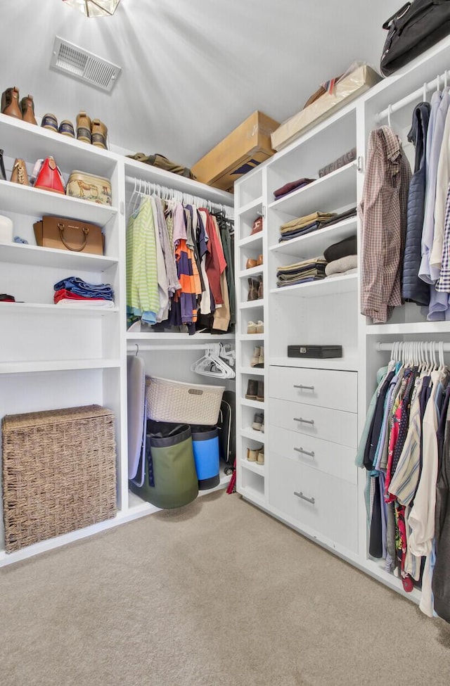 walk in closet with carpet flooring and visible vents